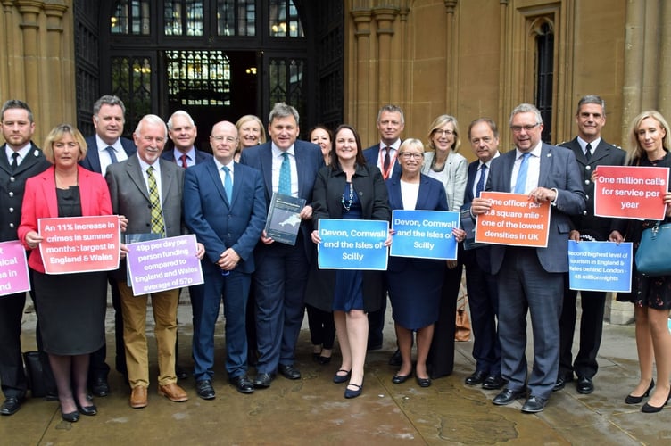Police and Crime Commissioner Alison HernandezÕs Devon and Cornwall delegation present Policing Minister Kit Malthouse with a dossier of evidence about the pressures placed on the force by the holiday season.Picture: LDR service