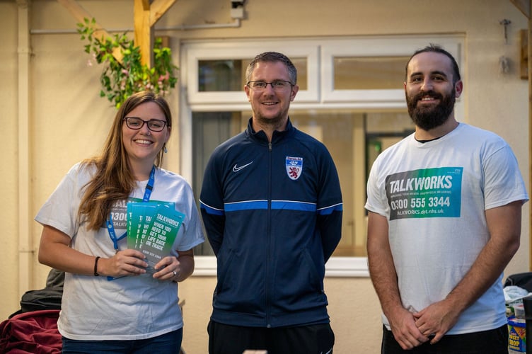 TALKWORKS representatives with Ashley Harris, centre, Devon FA Football Development Officer.