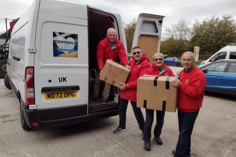 Lions loading donations from a previous Ukrainian aid trip.