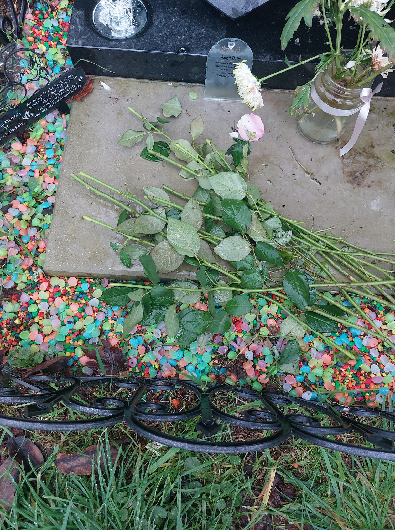 Mystery over nibbled flowers on baby’s grave