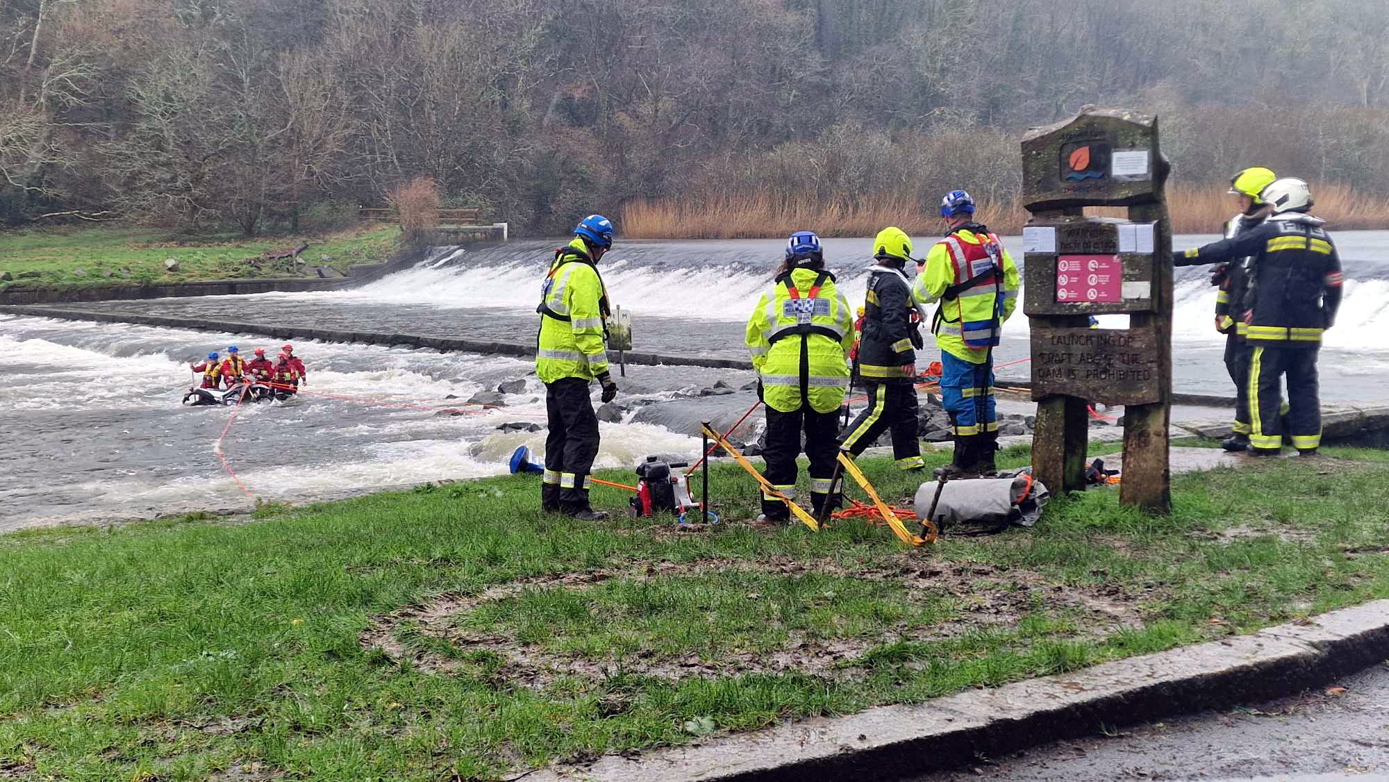 Biker rescued from river dam