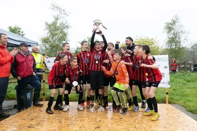 A winning team at last year's Mark Wickett Memorial Tournament.jpg