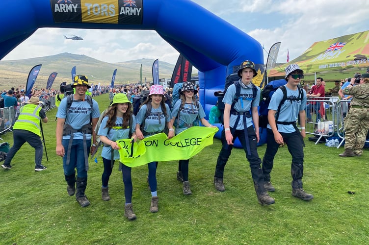 Okehampton College stars cheered after triumphing in the Ten Tors Challenge despite the heat.