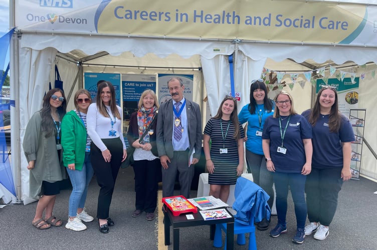 Devon County Council has a big stand at the Show and the Council Chairman, Percy Prowse was among the stand visitors on Thursday. AQ 2889