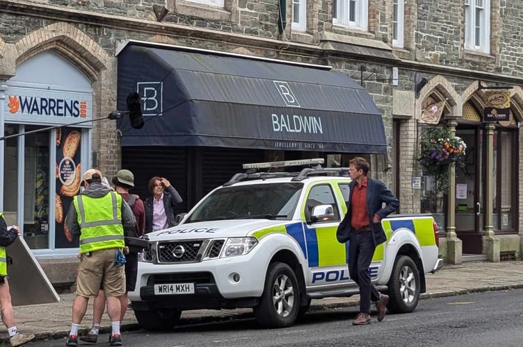 Kris Marshall with co-star Zahra Ahmadi filming Beyond Paradise in Tavistock.