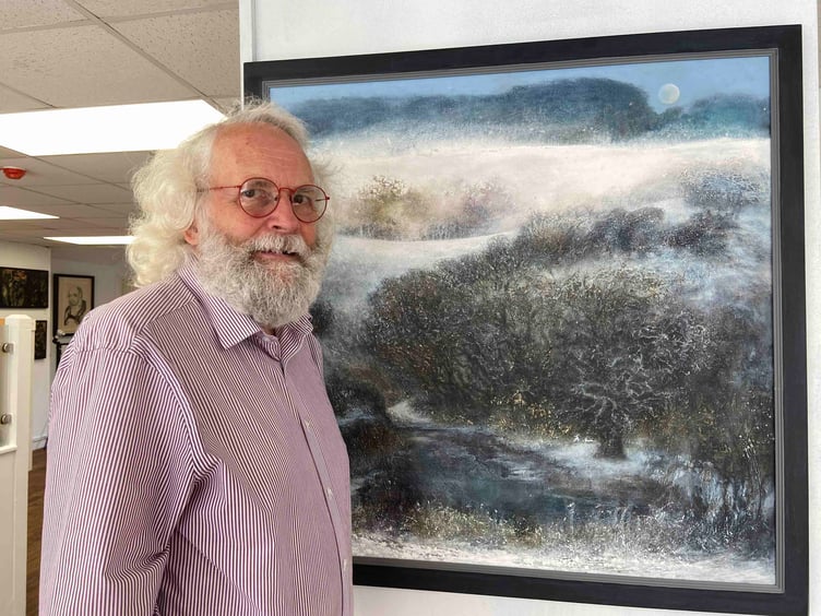 Roger Croxson with one of Ron Pyatt's paintings at the pop up exhibition