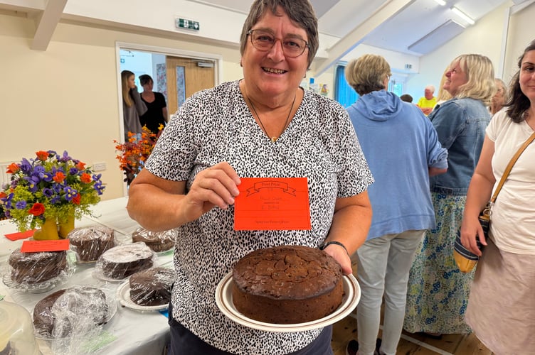 Elizabeth Daw had a first prize with her fruit cake.  AQ 1027