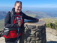 Teacher conquers mountain in friend's memory