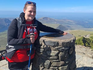 Teacher conquers mountain in friend's memory