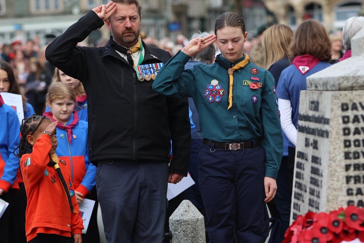 est Devon Scouts take the salute at Tavistock War Memorial Remembrance Sunday service.