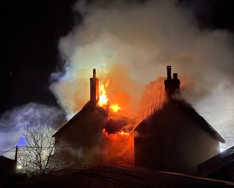 Firecrews at the scene of the thatched property fire in Drewsteignton.
Photo: The Drewe Arms Community Pub/Facebook