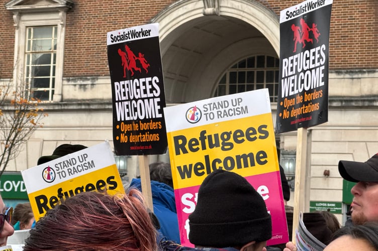 Placards at the Exeter is for Everyone counter protest.  AQ 6284