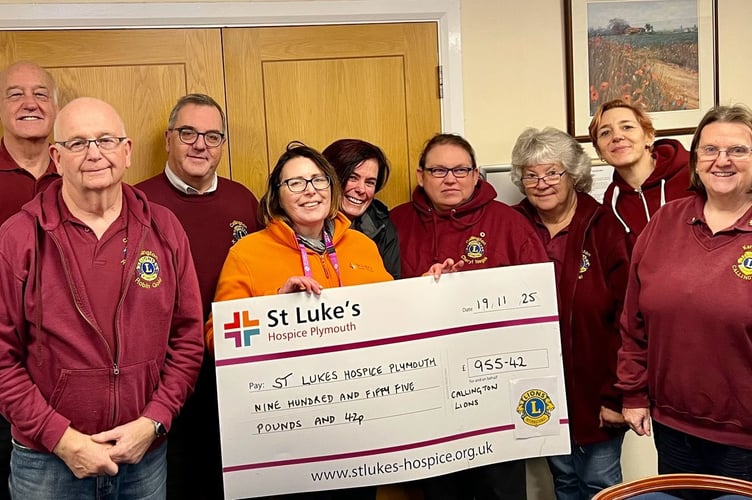 Members of Callington Lions handed over a cheque of £955.42 to Sarah Wallis from St Luke's Hospice 