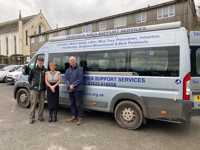 TASS volunteers Paul Newman and Bryan Podmore with TASS general manager Deb Morris and the ageing mini-bus that needs replacing.