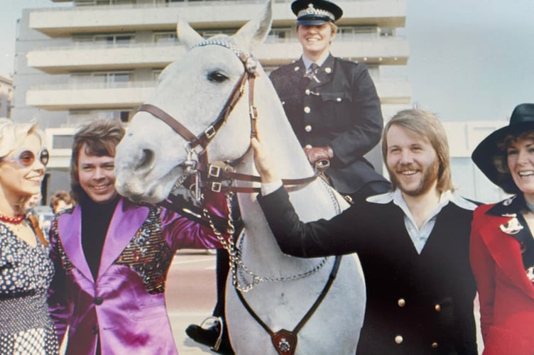 Tavistock resident Allen Lewis is pictured as a mounted police officer meeting Abba in Brighton. The chance encounter led to a life-time love of their music.