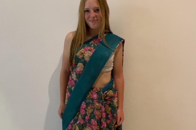 Walkhampton cricketer Charlotte Shutt, 15, on tour with Devon-U15 Cricket in Sri Lanka, immersing herself in local culture by wearing a sari.