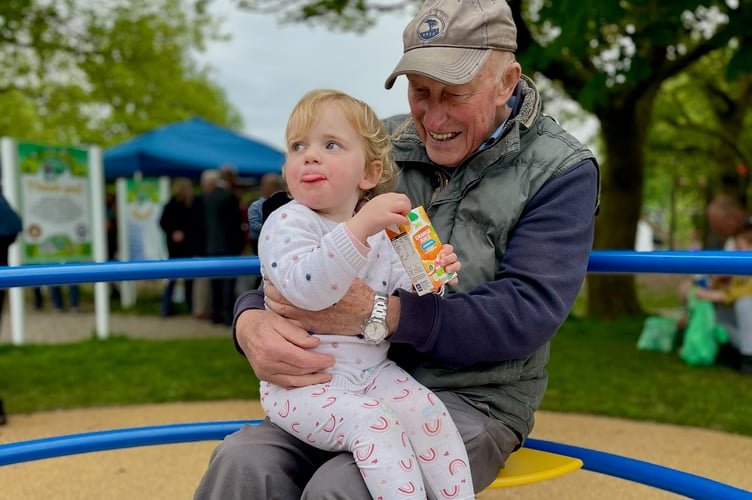 Brian Medhurst with his great grand-daughter Imogen at the launch of new play equipment at Yelverton. Brian is the founder of the park.