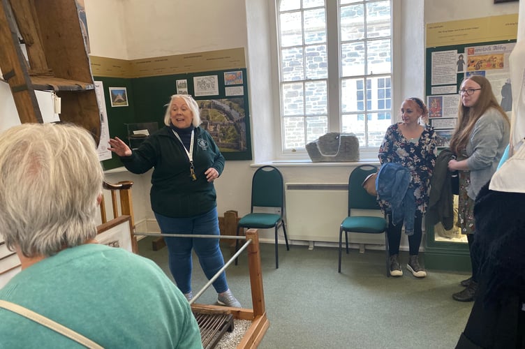Tavistock Museum launched this year's season after a winter of exiting plans came to fruition. Museum manager Lesley Holliday (right) is pictured showing launch guests round the new displays.