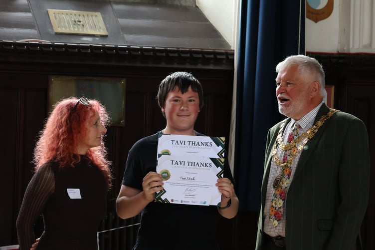 The volunteers behind TaviSkate group was recognised by the community at a new awards ceremony. Pictured is newly retired town Mayor Cllr Steve Hipsey presenting a Tavi Thanks award to xxx with Vicki Lloyd, of Tavistock Youth Cafe.