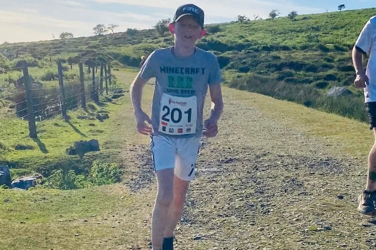 Matt Wildgoose, 11, completed the testing Princetown Fire Station 10km.