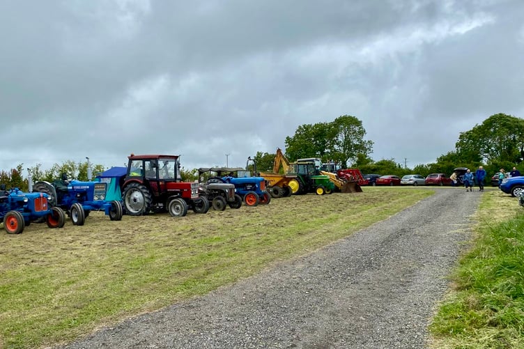 A line-up of tractors at Harlings Farm open day during the national Open Farm Sunday weekend to raise funds for its social enterprise Daniel's Ride.