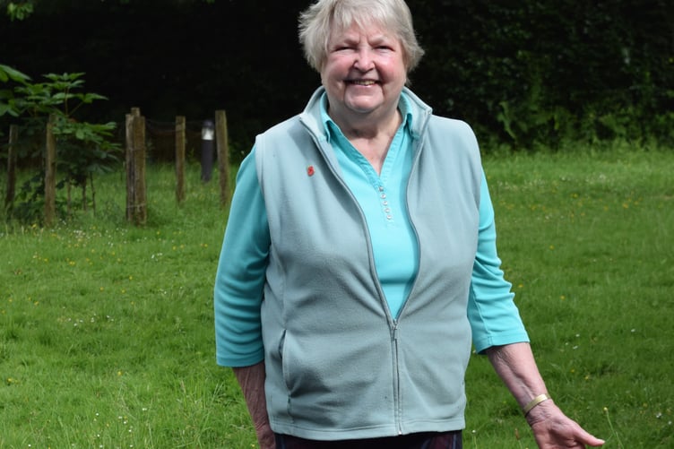 Celia Steven, known as ‘The Apple Lady', presents an apple tree to St Andrew's Academy at Buckland Monachorum.