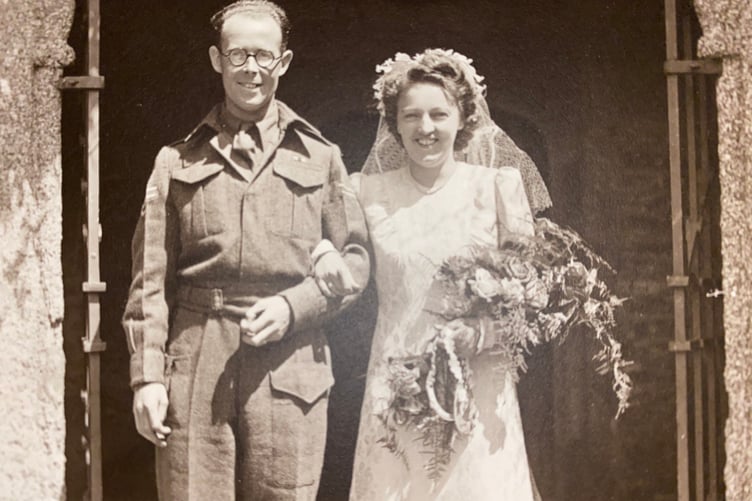 Pauline Richardson donated her mum's beautiful wedding dress to Tavistock Museum along with its interesting story. Pictured are her parents Peggy and Harold getting married
