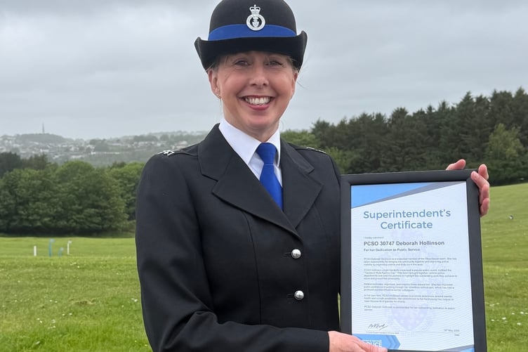 Tavistock area PCSO Debbie Hollinson proudly shows off her Superintendent's award for organising the Tavistock Multi-Agency Day which was even bigger on its second year.