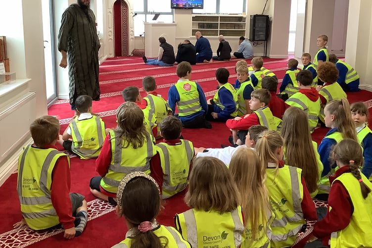 Pupils visit a mosque as part of their faith and culture learning.