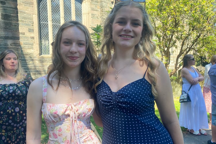 Two friends, Jasmine Cann and Jemima Trewartha 'relieved' after exams, attend Tavistock College GCSE year 11 graduation ceremony at Tavistock's St Eustachius' Church.
