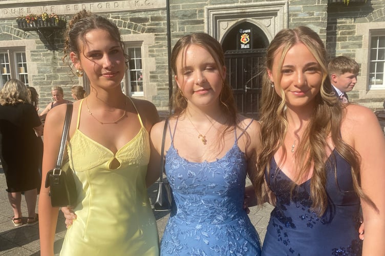 Milly Wilson, Tilly Pace and Ella Hughes celebrating the end of exams and school with hundreds of families and classmates in Tavistock's Bedford Square for Tavistock College pre-proms gathering.