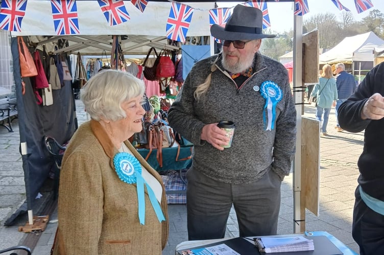 Reform UK councillor Michael Fife Cook speaking to Ann Widdecombe at an event promoting Reform UK in Bedford Square, Tavistock - he is among many local political figures who have paid tribute to her.