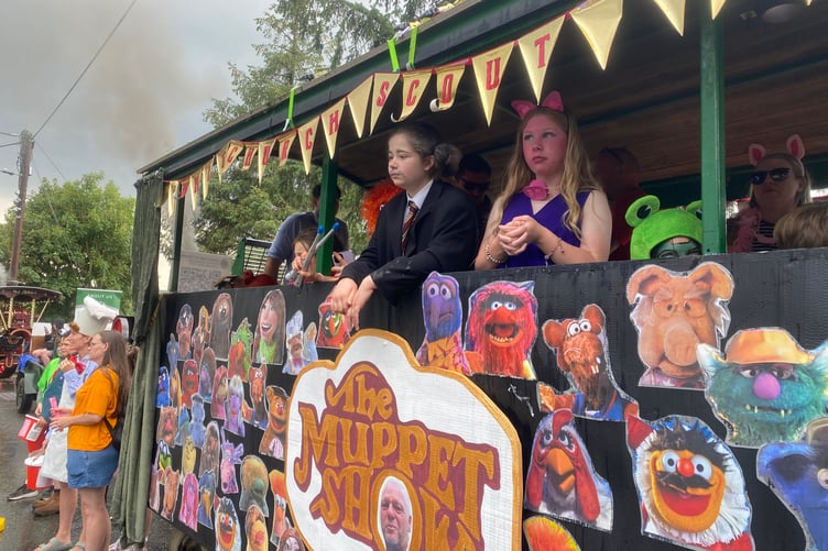Whitchurch Scouts on board a Robey Trust steam engine float in Tavistock Lions' Carnival Parade.