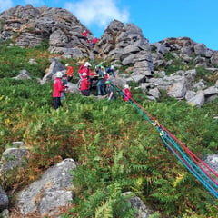 Volunteers rescue boy injured in fall from tor