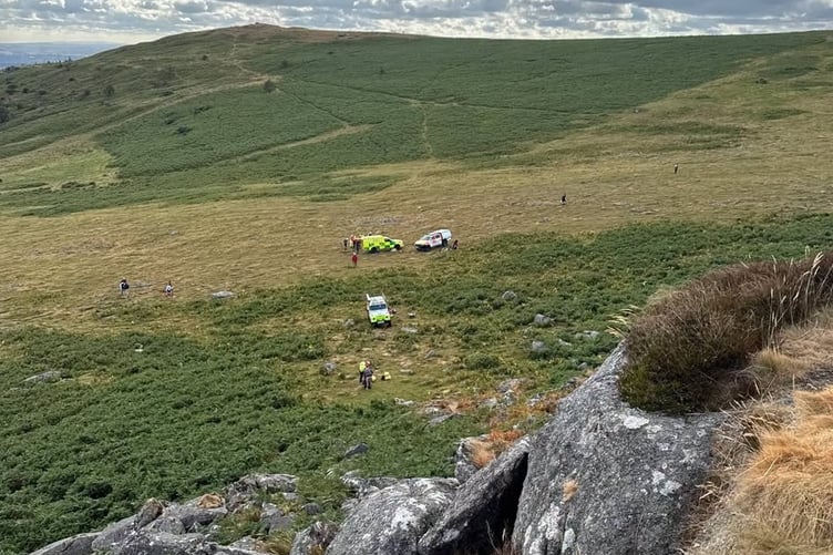 Dartmoor Search & Rescue Team Tavistock members on their way up a Dartmoor tor to rescue a boy who was hurt falling from the rocks.