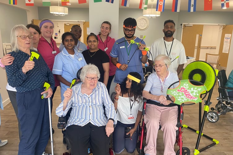 The Olympic spirit shone bright despite torrential rain at a Yelverton nursing home which staged its own games.