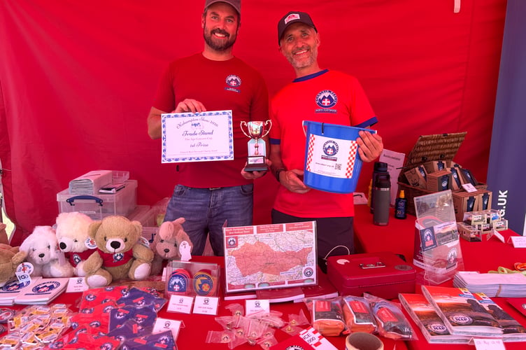 William Mann and Rob Gardner of the Okehampton-based North Dartmoor Search and Rescue Team, with their certificate and trophy for best trade stand at the show.