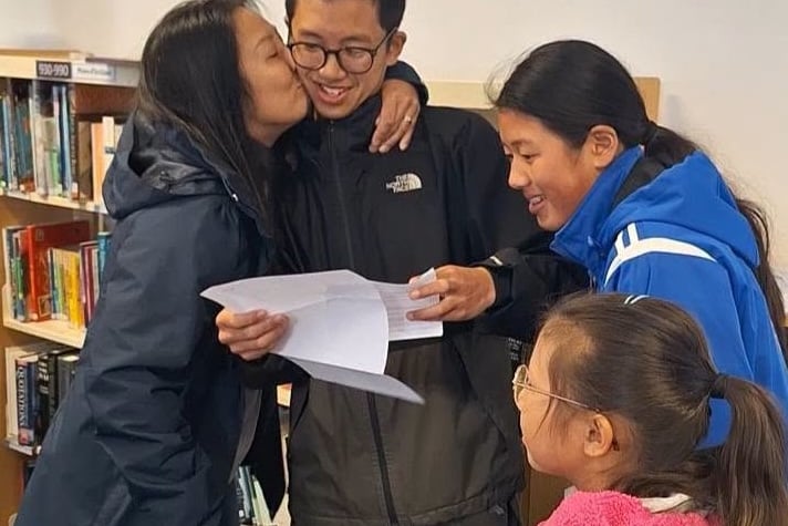 Ethan Lim celebrates his excellent results with his mum.
