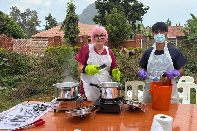 Claire Spencer left, of Horrabridge, sterilising dental equipment during a charity village dental clinic in Uganda.