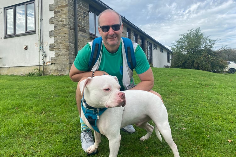 A man and his best friend put their best six legs forward for the Margaret Green sponsored mass dog walk.