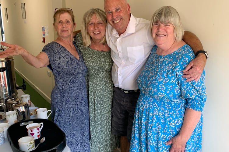 Staff and volunteers at Abbeyfield residential home in Tavistock celebrated the marriage of long-term volunteers Roy and Rotha Cole . Pictured are Delyth Ward, Jan Wickett, Garry Smith and June Foster.