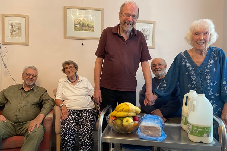 Newly-wed Roy and Rotha Cole celebrate at Abbeyfield residential home with guests in Tavistock where they volunteer.